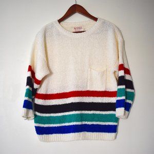 Vintage off-white sweater with bold stripes, 3/4 sleeves, and front pocket